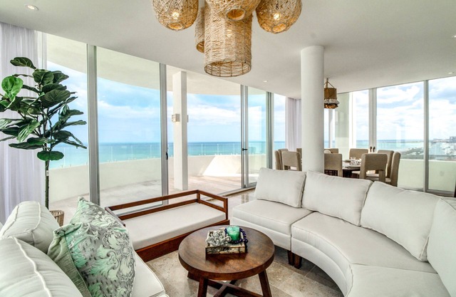 Palm-lined penthouse with plunge pool, amazing views, sauna, & balcony