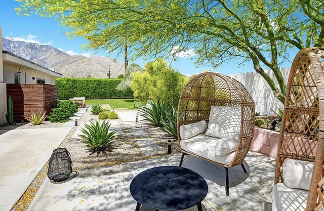Palm Springs oasis with pool, multiple patios & mountain views
