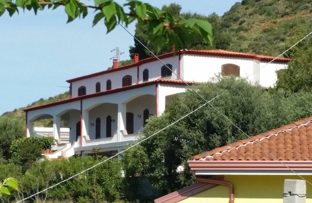 Panoramic apartment in villa 300 meters from the sea, private garden with sea view