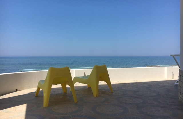 Panoramahaus mit Veranda am Meer