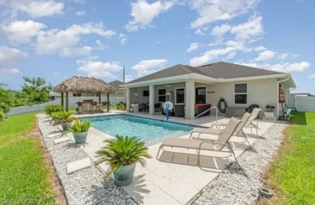Paradise of Cape Coral on Canal, with Heated Pool, Tiki Hut Grill & Elec Bikes