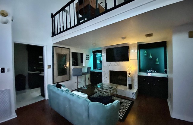 Parisian Marble Loft with a Garage near HWY55!