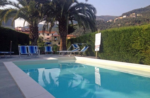 Part of a villa with pool.