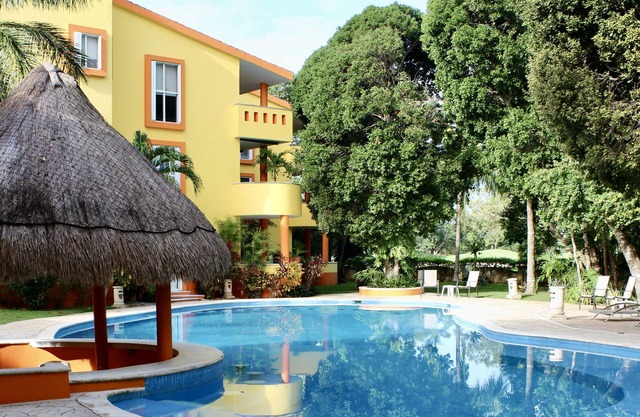 Peaceful Condo In Gorgeous Exclusive Playacar~ Playa del Carmen