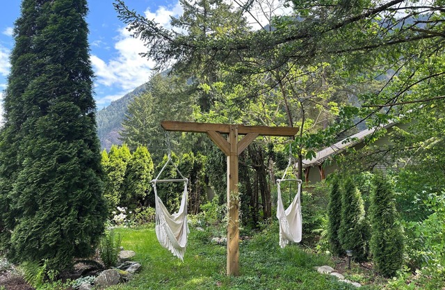 Peaceful mountainview suite surrounded by forest and gardens.
