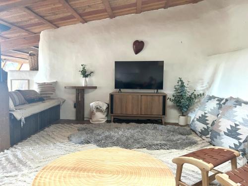 Peaceful Mt Top Earthship Retreat with Sauna & Views