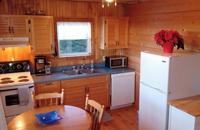 Peaceful river view cottage close to world class sandy beaches