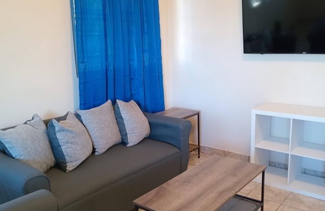 Enchanting 2-bedroom apartment in Arecibo with stunning river views nearby beach