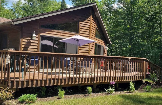 Peaceful Wooded Retreat Offering Immediate Access to all Trails and Area Lakes!