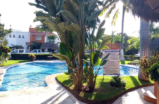 lovely vacation retreat with pool, nearby beaches within secure gated Street