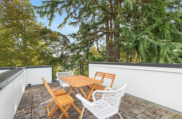 Perch - Roosevelt Retreat: Chic 2-Bed Townhome with Parking and Patio