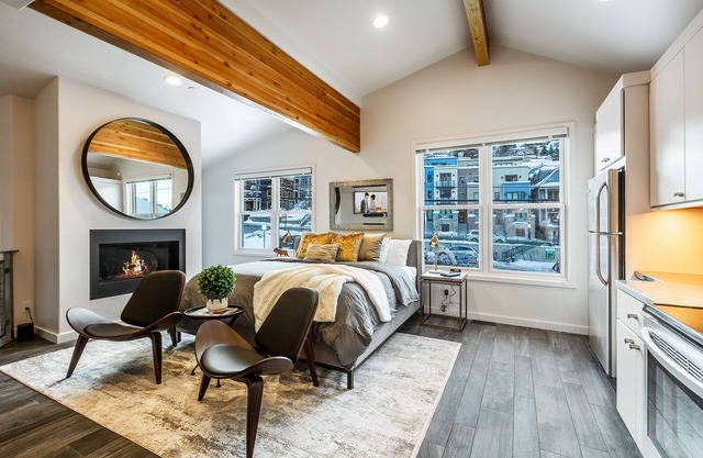 Perfect Couples Getaway Chic Tiny Home Fireplace AC Balcony Steps from Main St.