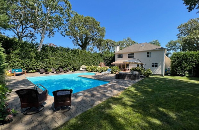 Perfect Hamptons Getaway! Beautiful home with great outdoor living & heated pool