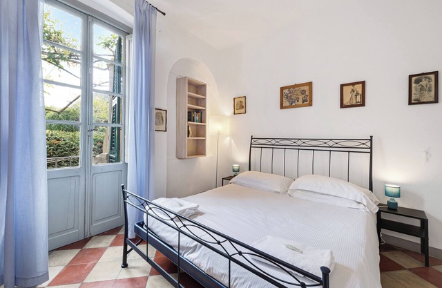 Haustierfreundliche Ferienwohnung Monolocale Isotta mit Bergblick, Balkon und WLAN