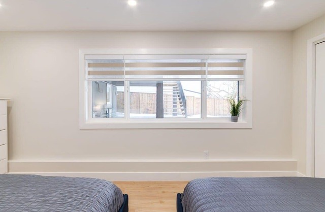 Pet Friendly Basement Suite w/ 3 Queen Beds