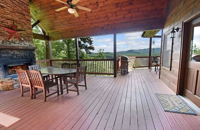 Pet-friendly, mountain view cabin rent with an outdoor fireplace, hot tub and pool table. Free WiFi