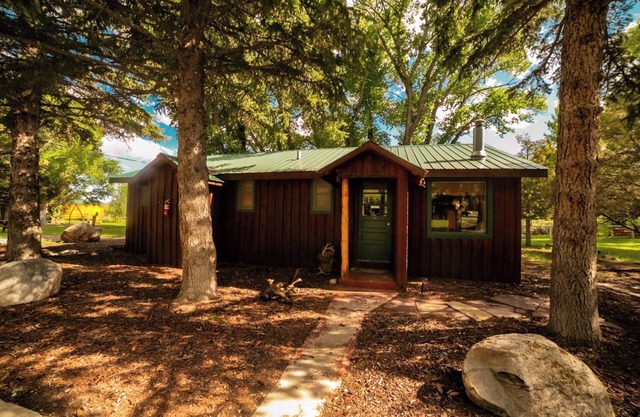 Pet-Friendly Studio Cabin with River Access, Mountain Views & Hot Tub!