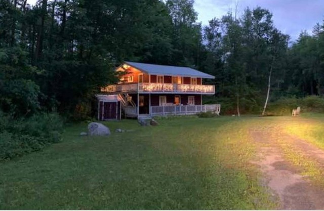 Picturesque Vt home w/double lvl wrap around deck