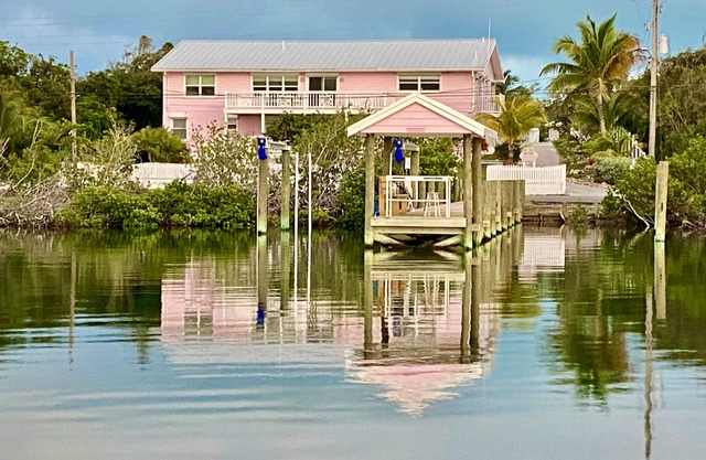 Pink Bikini Island Cottage with a dock on Black Sound