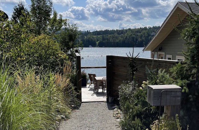 Pisgah Cottage perched on the waters edge of Lake Willoughby