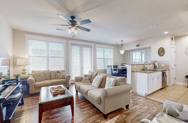 Pointe West getaway with pool, hot tub & bay-view balcony - walk to beach