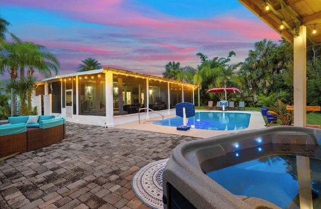 Pool and Hot Tub Home with Pickle Ball Court and Walk to Downtown