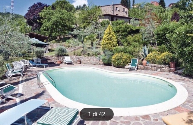 Teil des Bauernhauses im Chianti mit Panorama-Pool