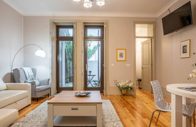 Porto Historic: 1BR w/ Private Patio by LovelyStay