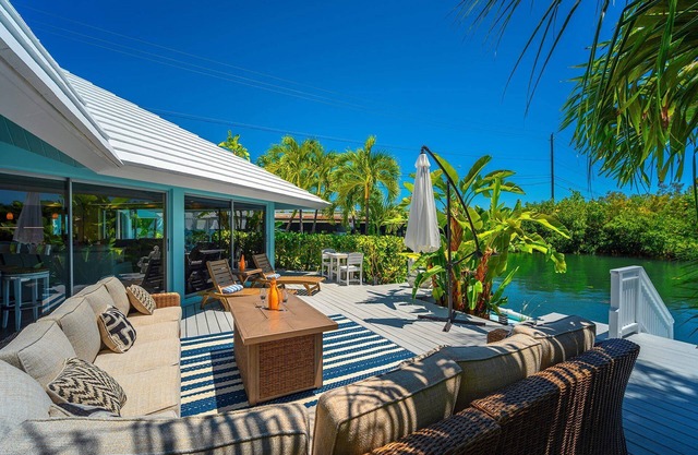 Poseidon's Paradise: Luxury Waterfront Rental in Key West, Stunning Backyard Oasis and Private Pool!