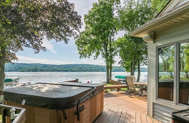 Premier lakefront property with upscale finishes and stunning sunset views!