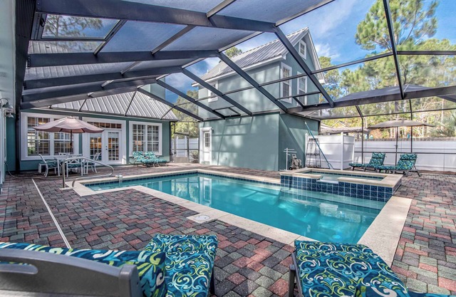 Private 5-bedroom house with private screened in pool and beach access