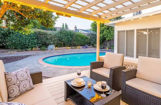 Private bedroom overlooking beautiful yard & pool