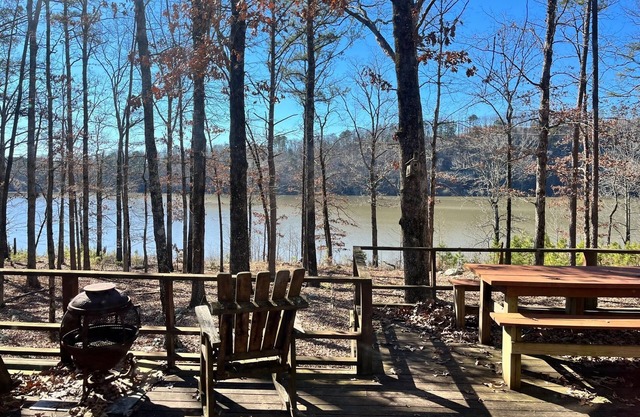 Private cabin on 300 ft of lake shoreline. Hike, fish, and read in seclusion.