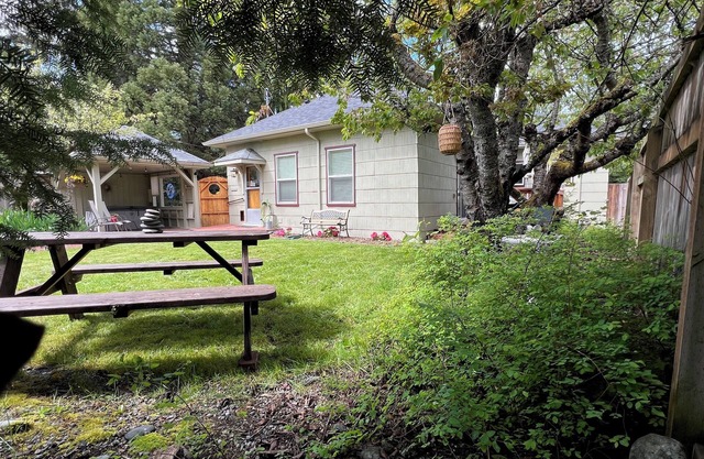 Private, charming 3 bedroom house. Hot tub. Fenced compound feeling.