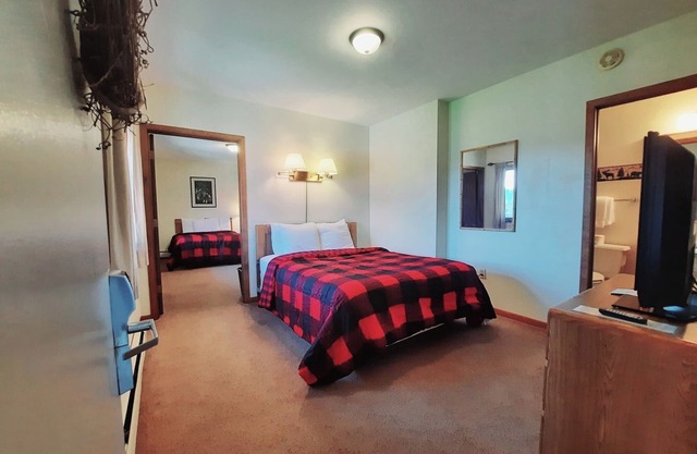 Private family style, corner room in our Lodge at North Ironwood Acres resort offering a sunrise view. 3 beds. 2 bathrooms. DOG FRIENDLY!