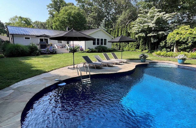 Private home on a private road. Swimming pool, hot tub and complete gym.