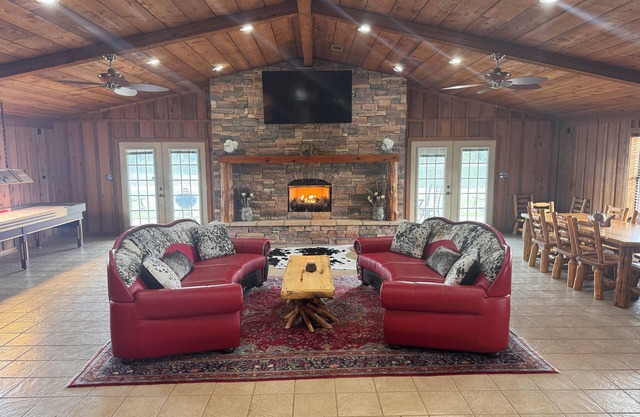 Private Lake Lodge on 104 acres with bar, pool table, shuffle board and more!