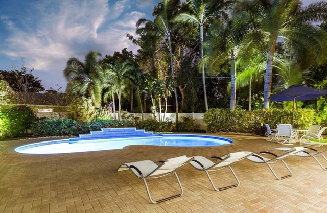 Private Tropical Oasis, Pool! Walk to shopping & entertainment. Great Location.