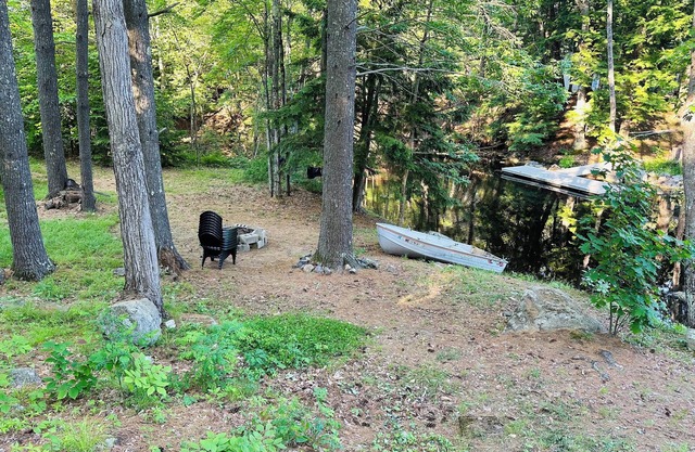 Professionally styled waterfront cottage on Sebago. Cozy and Serene.