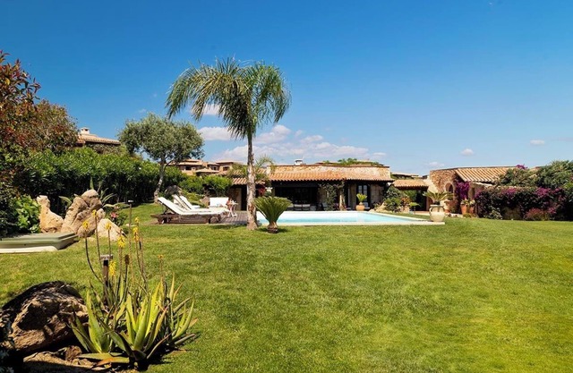 Puntaldia Seaview Four 5 bedroomed villa with large garden, sea views and pool