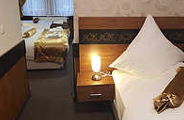 Vierbettzimmer (1 Doppelb., 2 Einzelb.), inkl. Frühstück - Hotel Im Anker