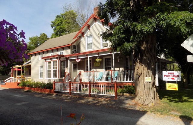 Quaint 1890's farmhouse remodeled maintaining its charm, ambiance & character.