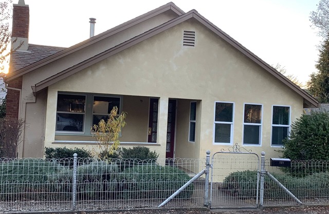 Quaint two bedroom residential home with wood stove