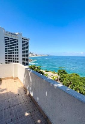 Quarto de frente para o mar