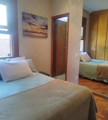 Quarto Suite -Em apartamento familiar