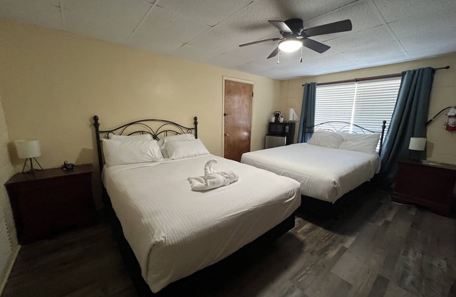 Queen Guest Room located at the Joplin Inn at the entrance to Mountain Harbor, just 2 1/2 miles from Lake Ouachita. by RedAwning