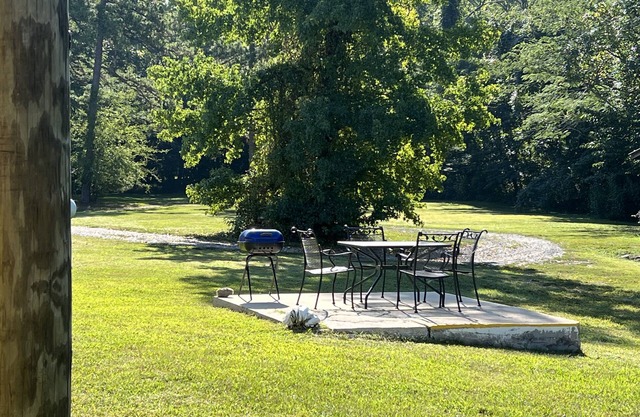 Queen Guest Room located at the Joplin Inn at the entrance to Mountain Harbor,, just 2 1/2 miles from Lake Ouachita. by RedAwning
