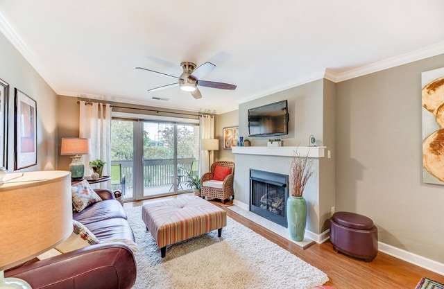 Quiet 1 Bed condo with in unit laundry & assigned covered parking in secure bldg