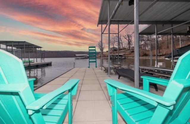Quiet Cove, open slip, kayaks, lily pad, great dock and view plus fire pit area!