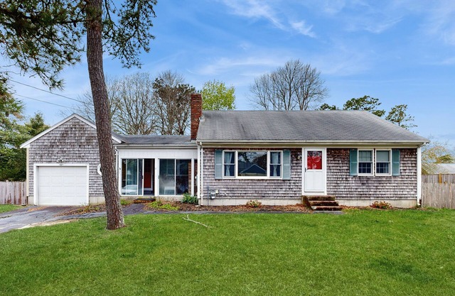 Quiet home in central location with deck, W/D, & large yard